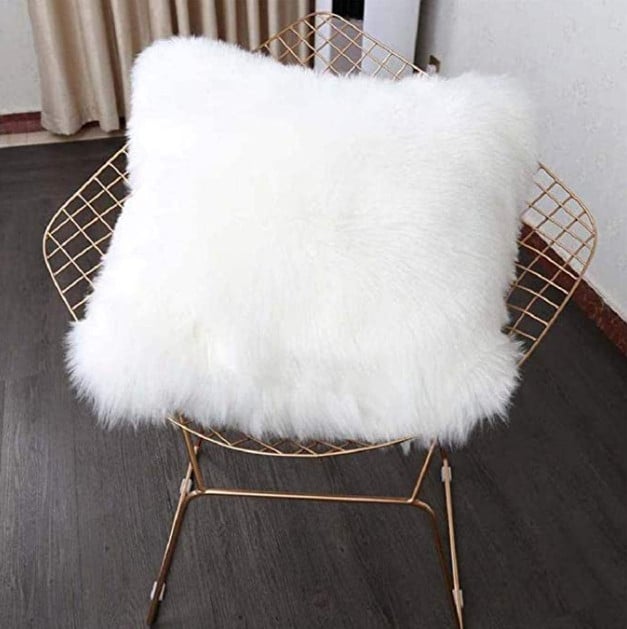 white faux fur cushion 