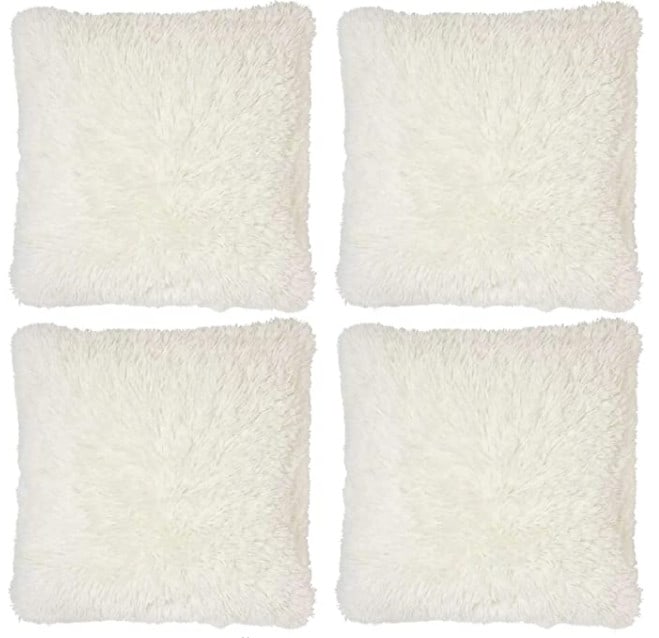Four pieces, faux fur pillowcases cream